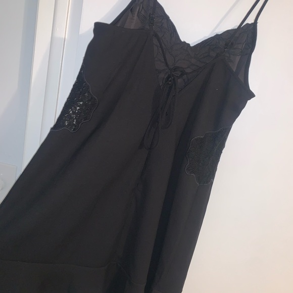 Lulu’s, never worn. Size: L. Black lace cut out mini dress with ruffles. - Picture 4 of 4